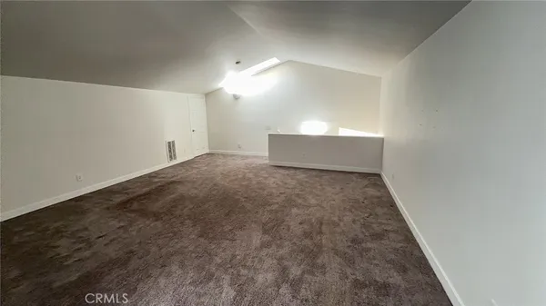 a view of room with cabinets