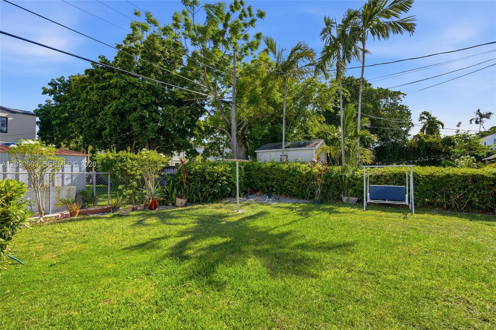 3750 Southwest 27th Street Miami, FL 33134 - Photo 30 of 41 a view of a backyard with a garden