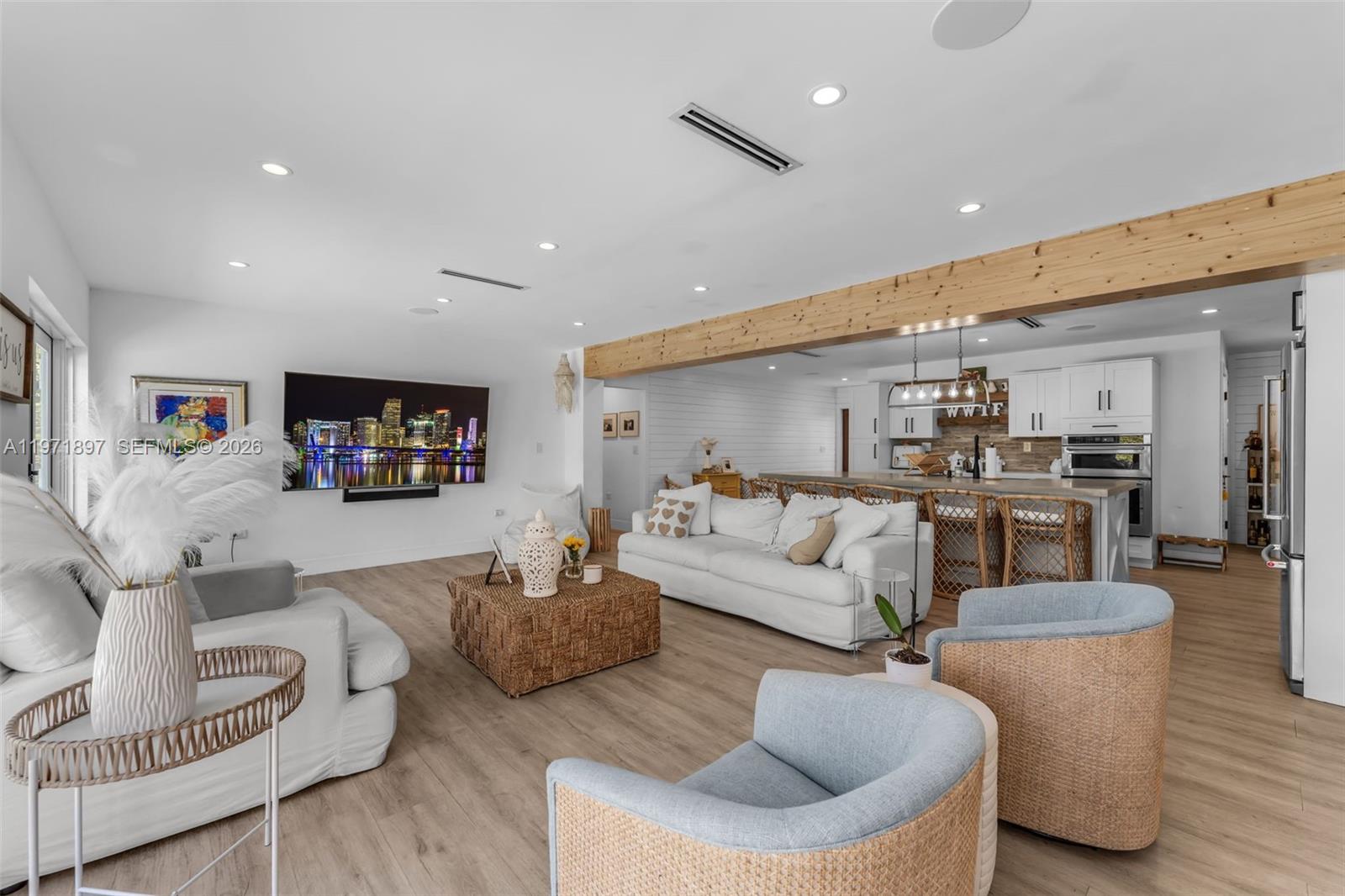 8311 Southwest 47th Street Miami, FL 33155 - Photo 11 of 48 a living room with furniture and a flat screen tv