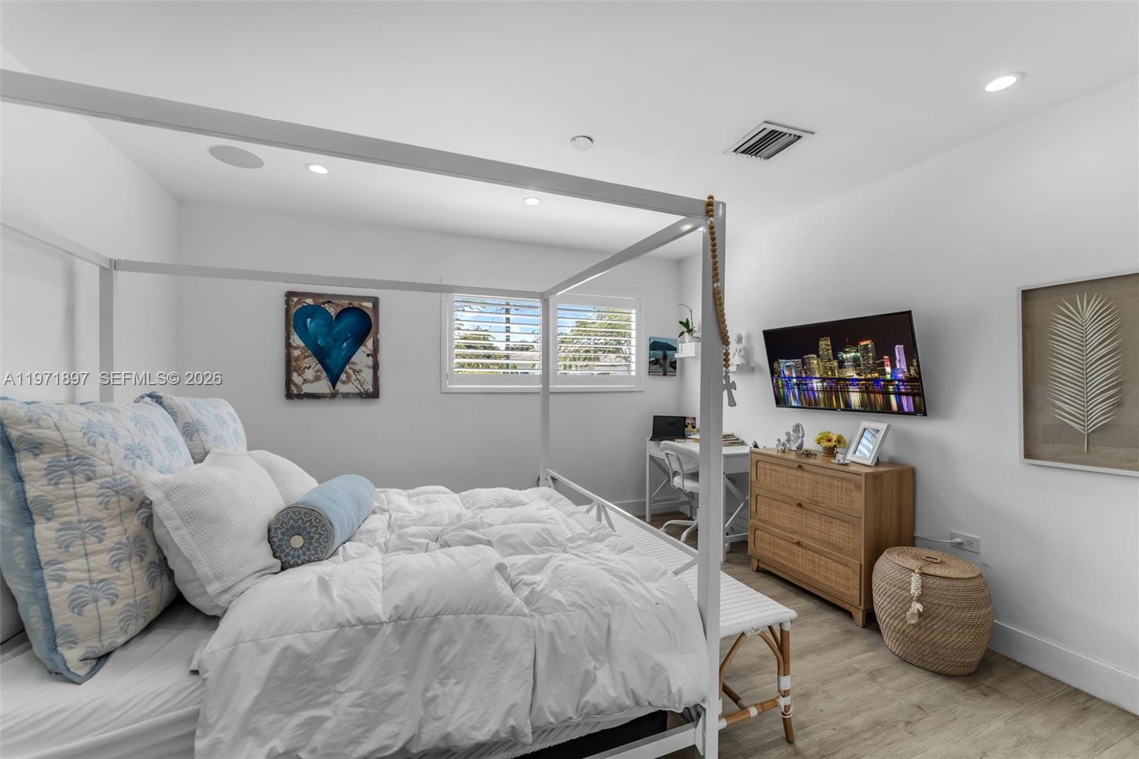 8311 Southwest 47th Street Miami, FL 33155 - Photo 26 of 48 a bedroom with furniture and a window