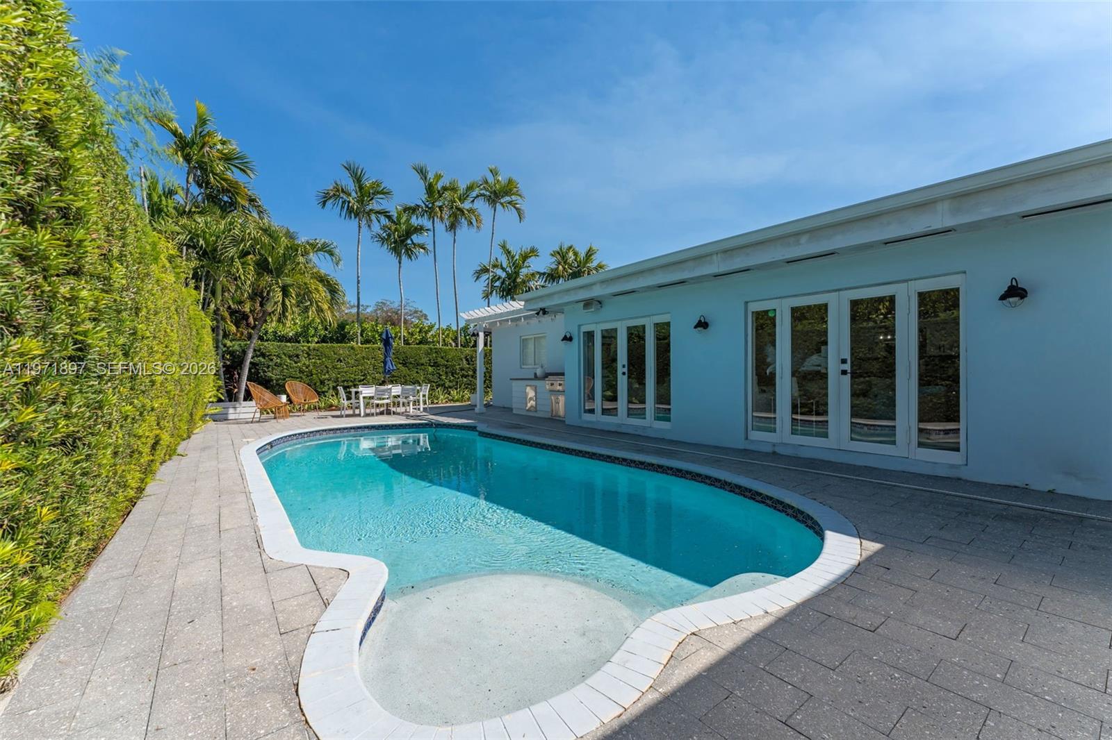 8311 Southwest 47th Street Miami, FL 33155 - Photo 30 of 48 swimming pool view with a seating space