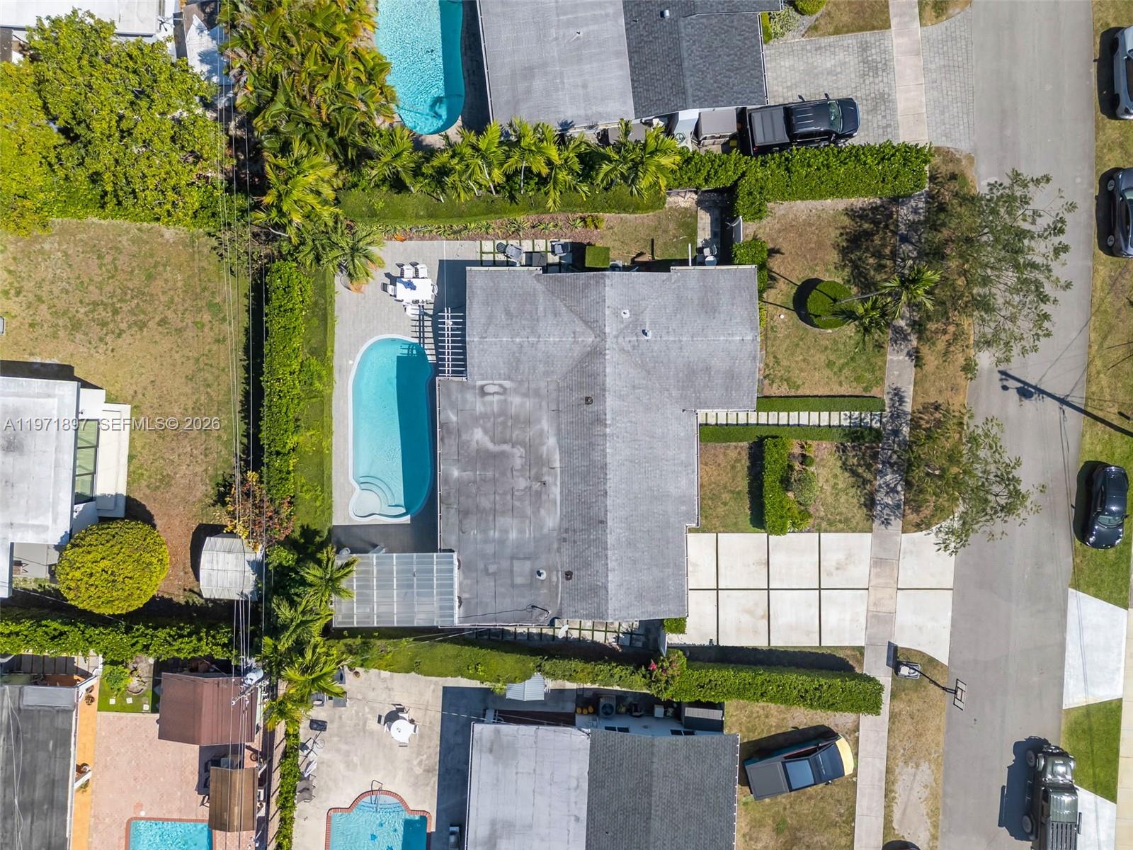 8311 Southwest 47th Street Miami, FL 33155 - Photo 37 of 48 a aerial view of a house with a swimming pool