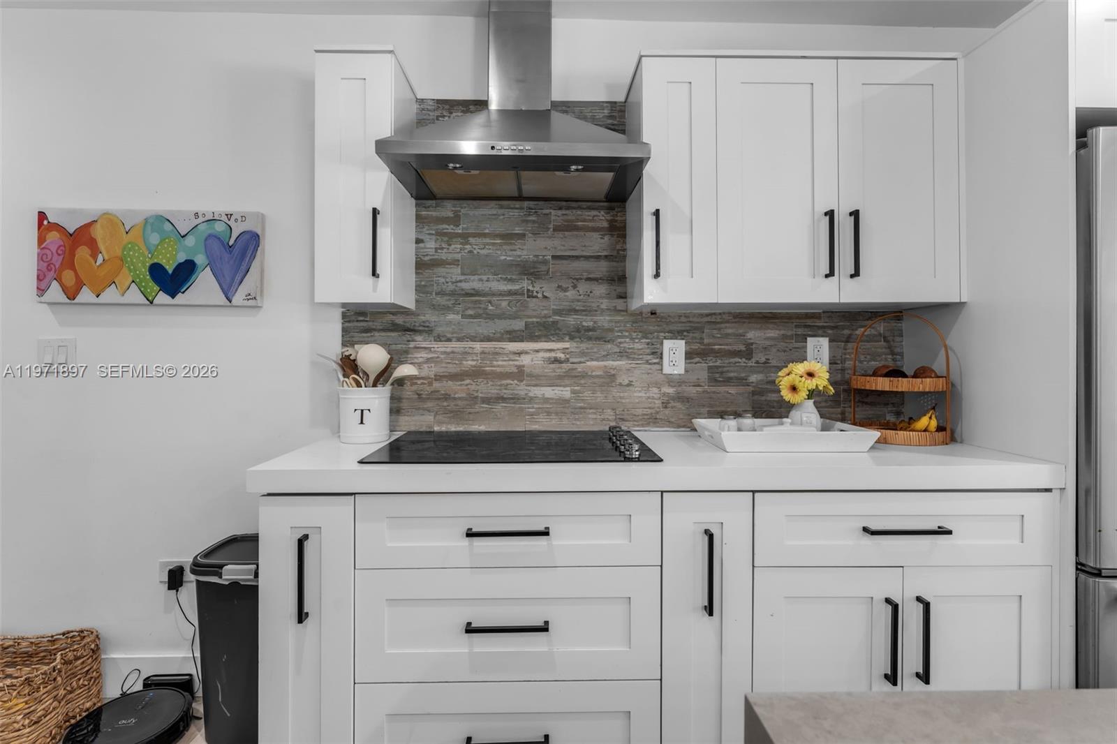 8311 Southwest 47th Street Miami, FL 33155 - Photo 9 of 48 a kitchen with a sink and cabinets