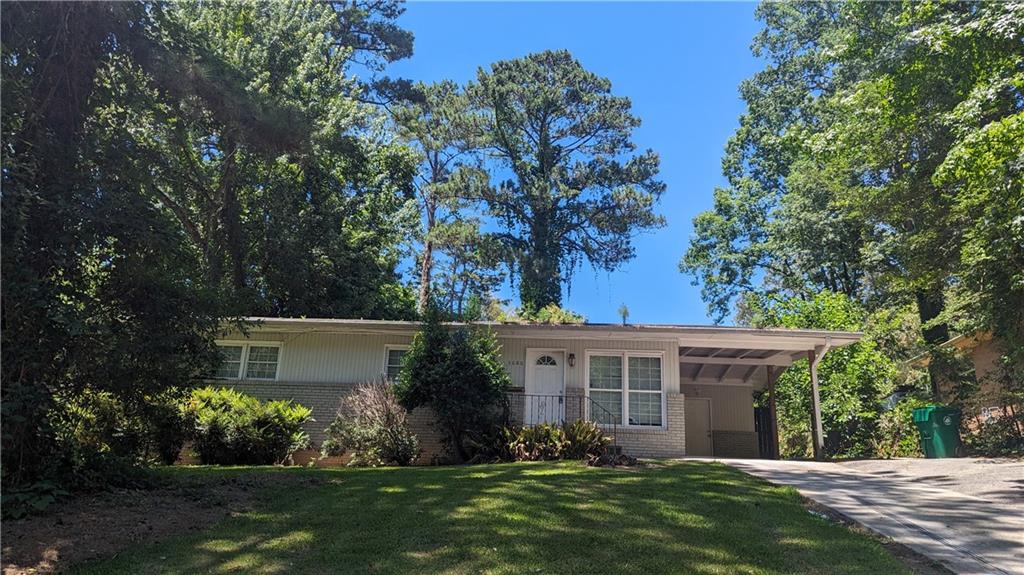 3680 Larkspur Terrace Decatur, GA 30032 - Photo 1 of 1 front view of a house with a yard