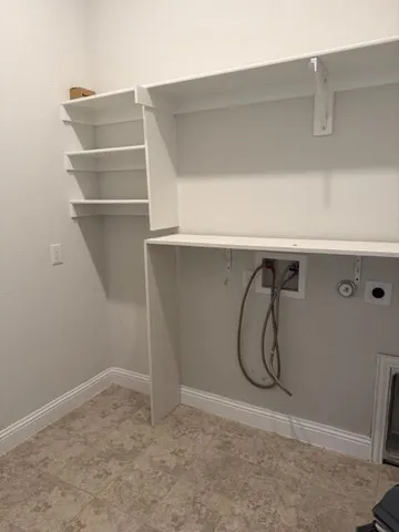 a view of a room with rack on the wall