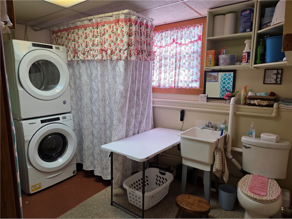 1506 Marshall Road Waterloo, NY 13165 - Photo 18 of 44 Laundry, half bath & utility room in basement