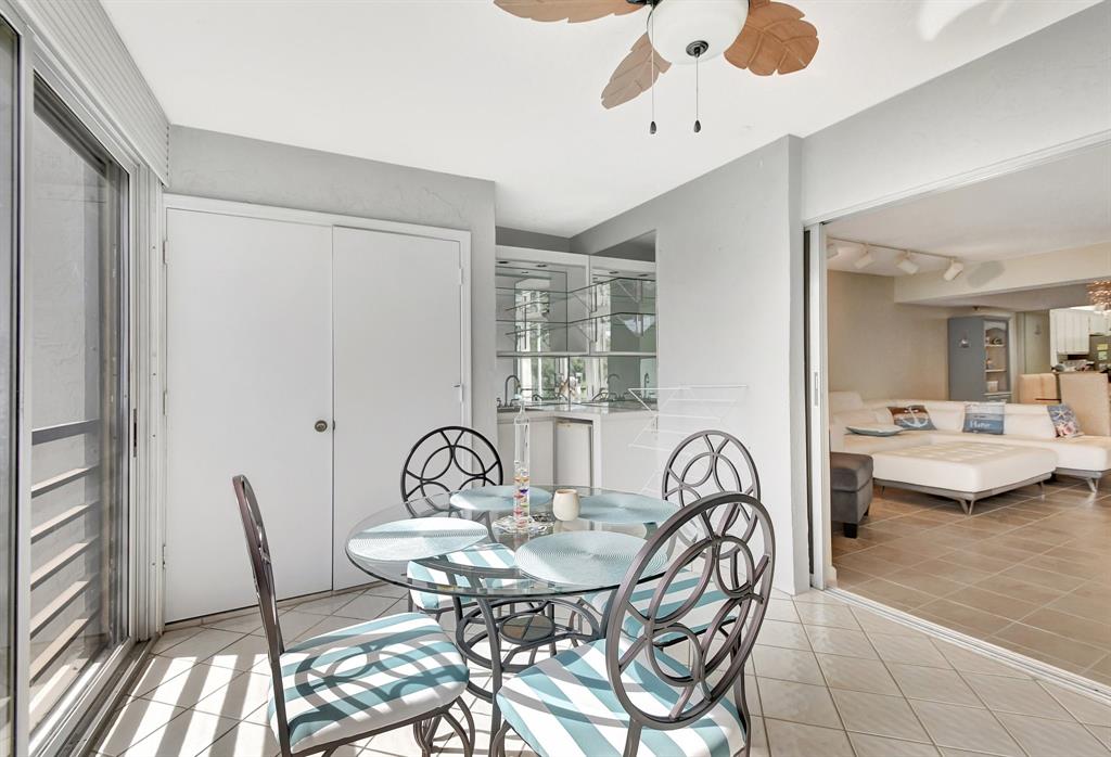 9220 Southwest 14th Street, Unit 3304 Boca Raton, FL 33428 - Photo 31 of 46 a view of a dining room with furniture and window