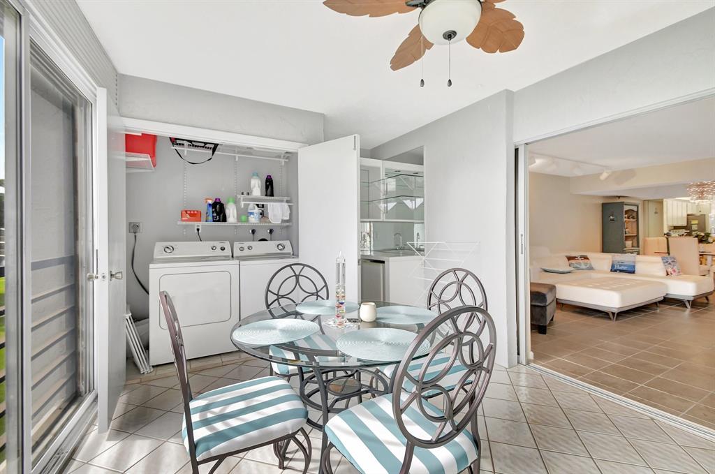 9220 Southwest 14th Street, Unit 3304 Boca Raton, FL 33428 - Photo 32 of 46 a view of a dining room with furniture