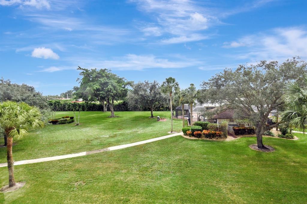9220 Southwest 14th Street, Unit 3304 Boca Raton, FL 33428 - Photo 33 of 46 a view of a park with large trees