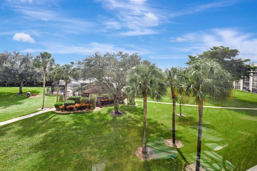 9220 Southwest 14th Street, Unit 3304 Boca Raton, FL 33428 - Photo 35 of 46 a view of a park with houses
