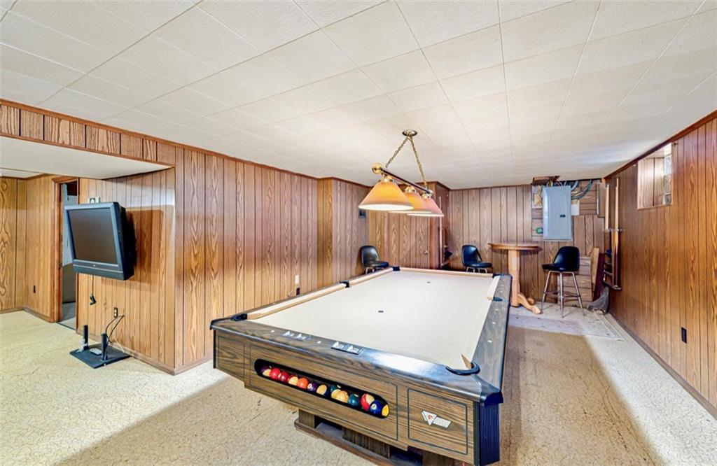 121 Sampson Drive Apollo, PA 15613 - Photo 15 of 33 a room with furniture and a flat screen tv