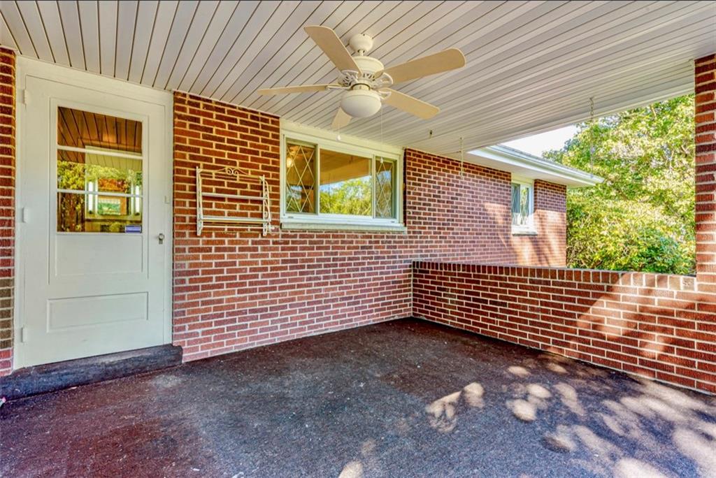 121 Sampson Drive Apollo, PA 15613 - Photo 16 of 33 a view of a brick house with a large window