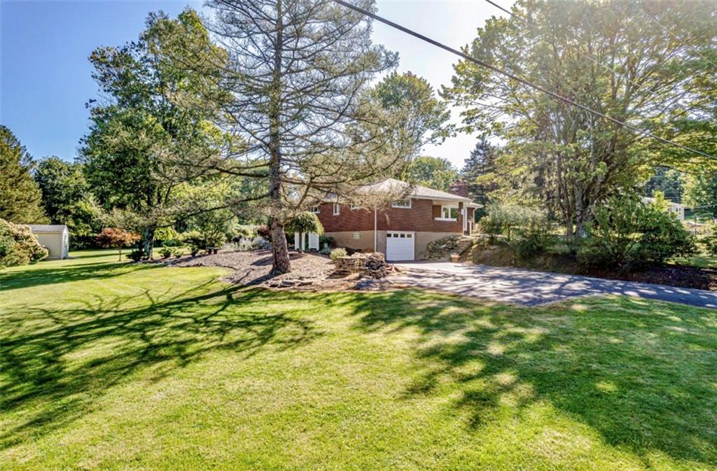 121 Sampson Drive Apollo, PA 15613 - Photo 2 of 33 a view of a swimming pool with a patio