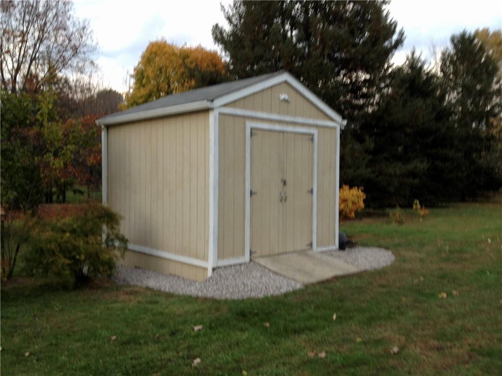 121 Sampson Drive Apollo, PA 15613 - Photo 21 of 33 a front view of a house with garden