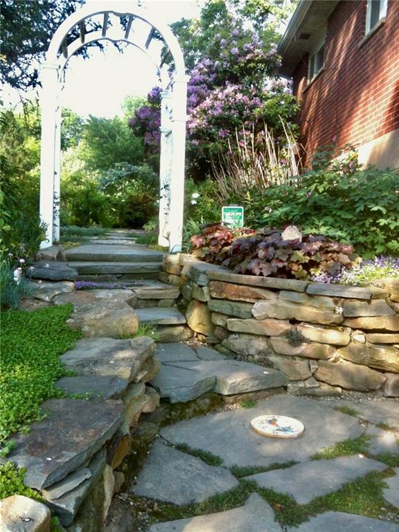 121 Sampson Drive Apollo, PA 15613 - Photo 26 of 33 a view of a swimming pool with a patio and plants