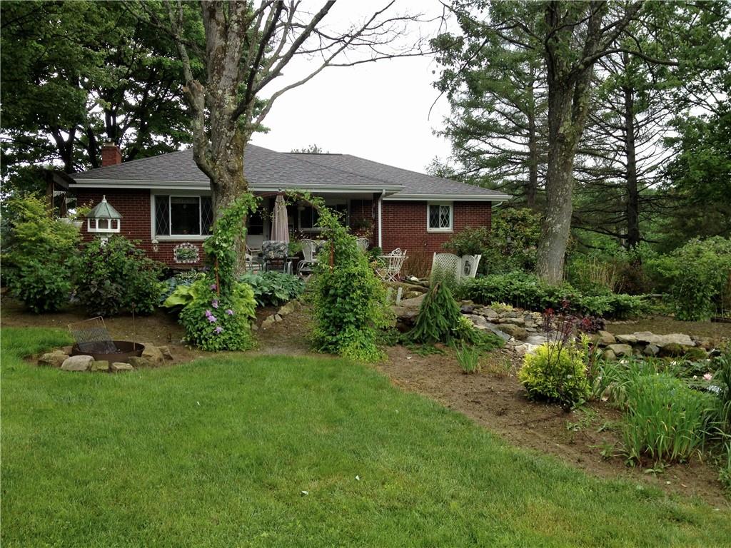 121 Sampson Drive Apollo, PA 15613 - Photo 30 of 33 a front view of a house with a yard