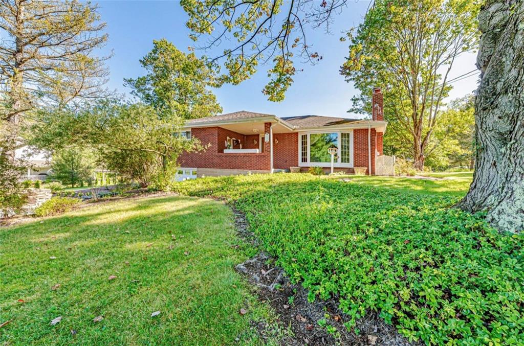 121 Sampson Drive Apollo, PA 15613 - Photo 3 of 33 a front view of a house with a yard