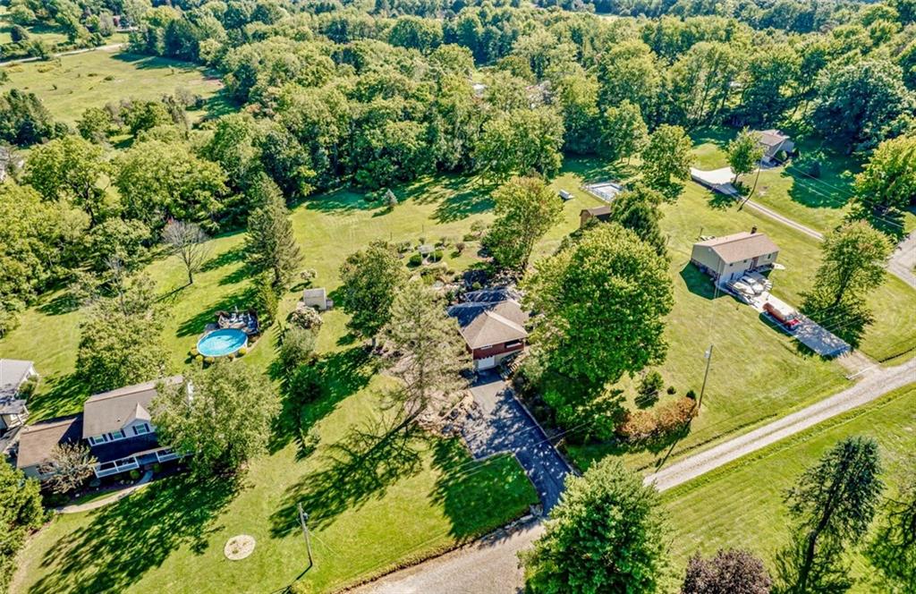 121 Sampson Drive Apollo, PA 15613 - Photo 33 of 33 an aerial view of residential house with outdoor space and trees all around