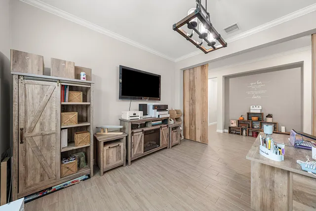a open kitchen with stainless steel appliances granite countertop a stove and refrigerator