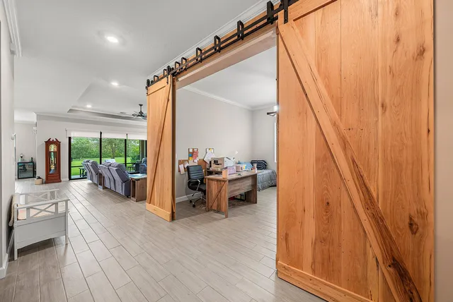 a view of a living room and hardwood floor