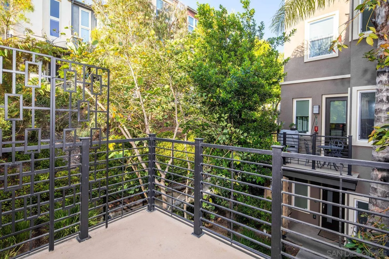 7830 Inception Way San Diego, CA 92108 - Photo 11 of 37 a view of a brick building with many windows