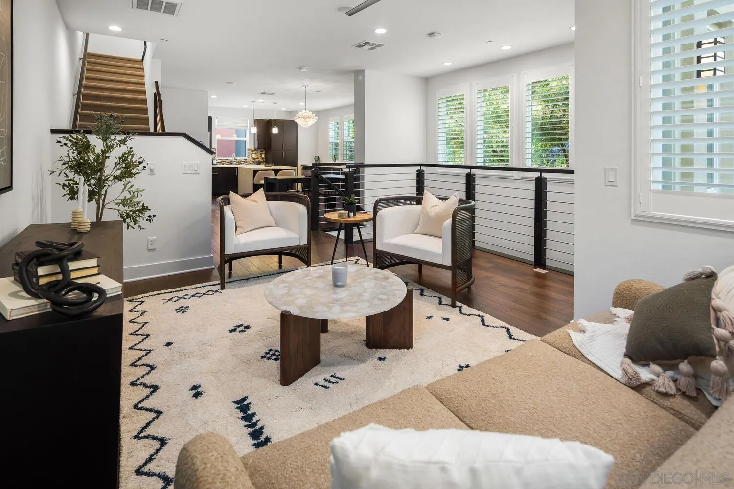 7830 Inception Way San Diego, CA 92108 - Photo 12 of 37 a living room with furniture and wooden floor