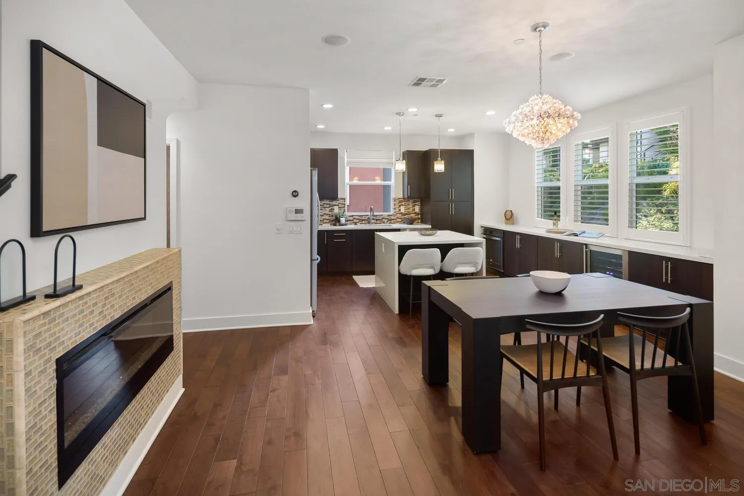 7830 Inception Way San Diego, CA 92108 - Photo 13 of 37 a view of a dining room with furniture window and wooden floor