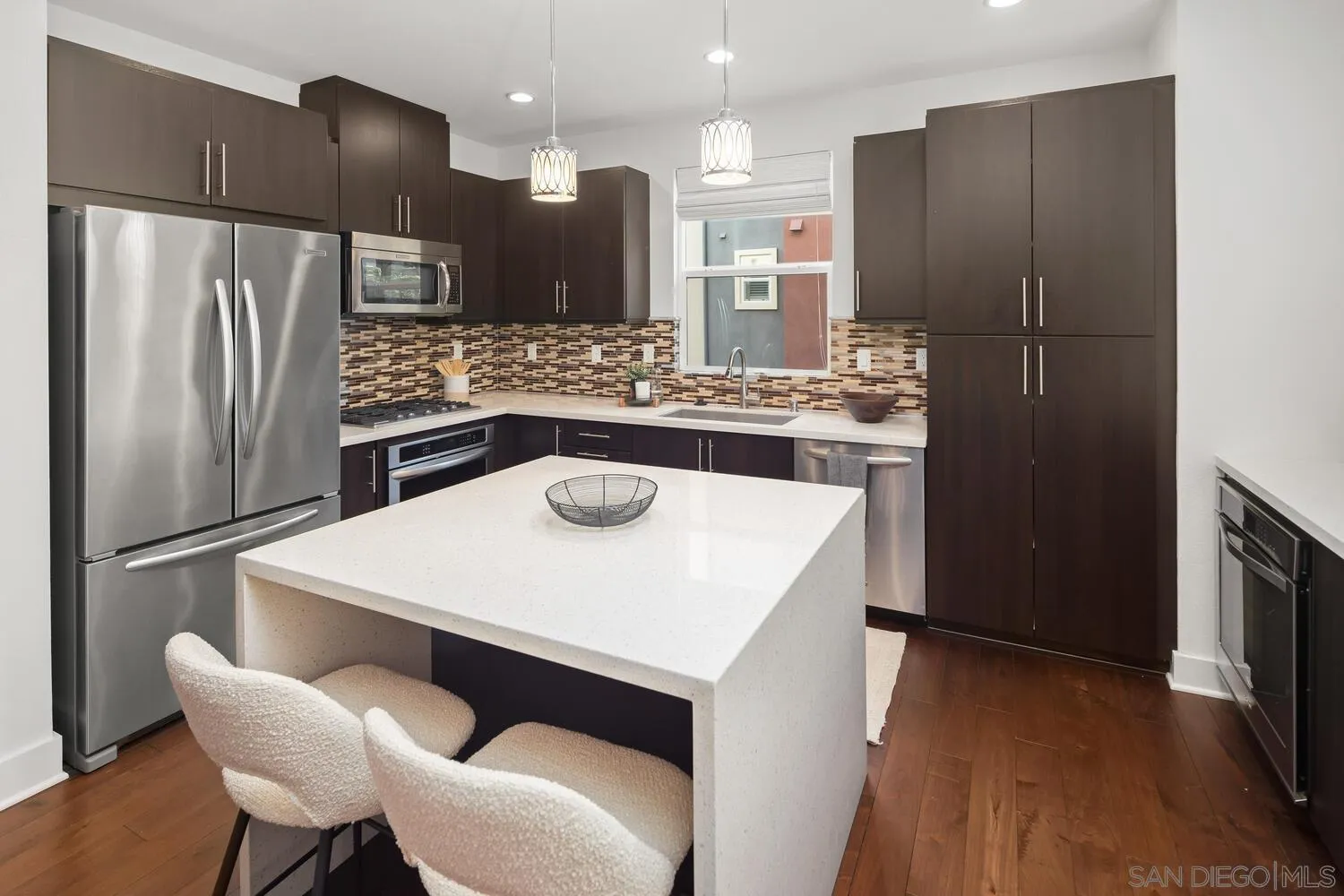 7830 Inception Way San Diego, CA 92108 - Photo 16 of 37 a kitchen with stainless steel appliances a refrigerator and a stove