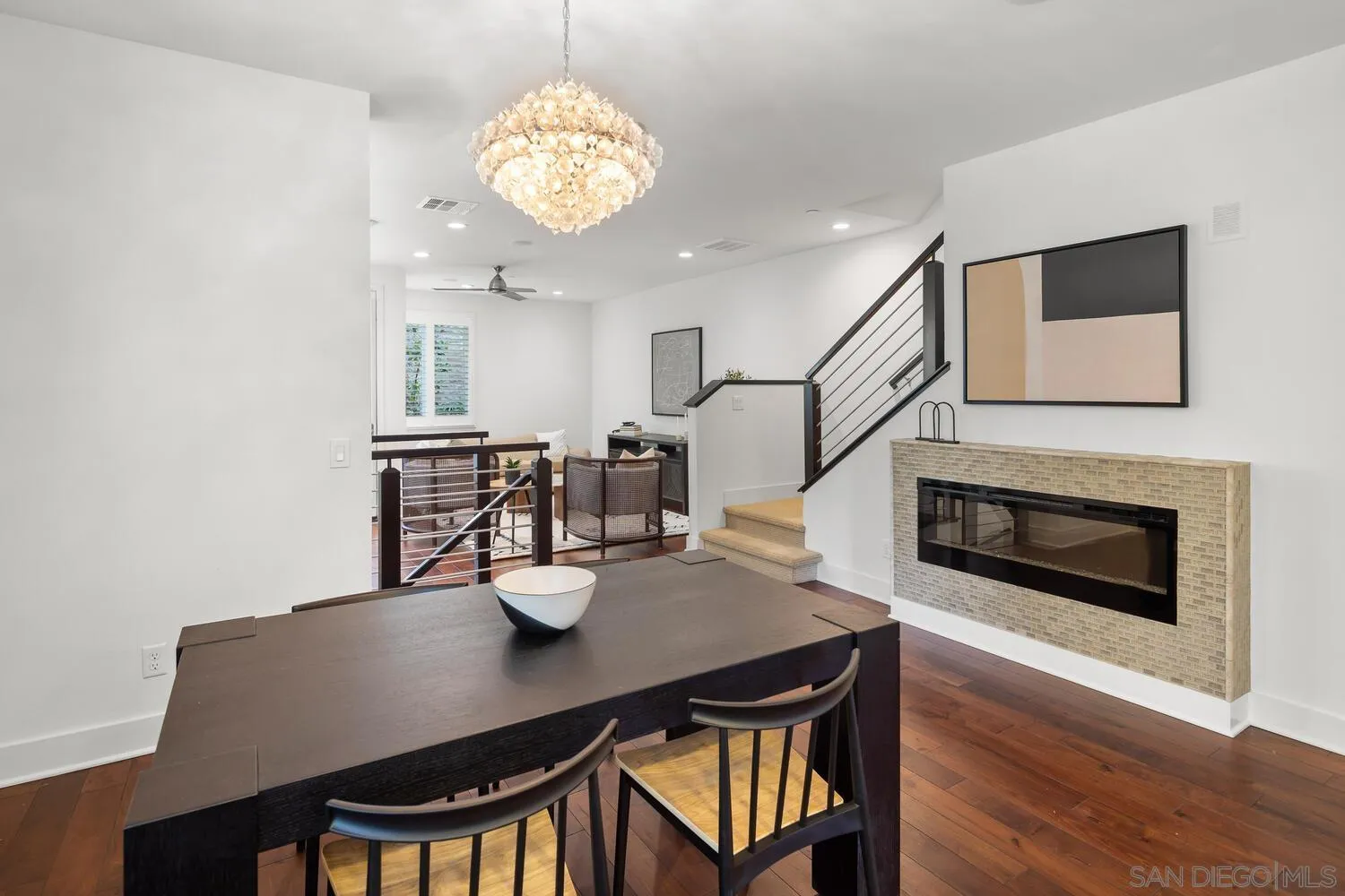 7830 Inception Way San Diego, CA 92108 - Photo 18 of 37 a view of a dining room with furniture and wooden floor