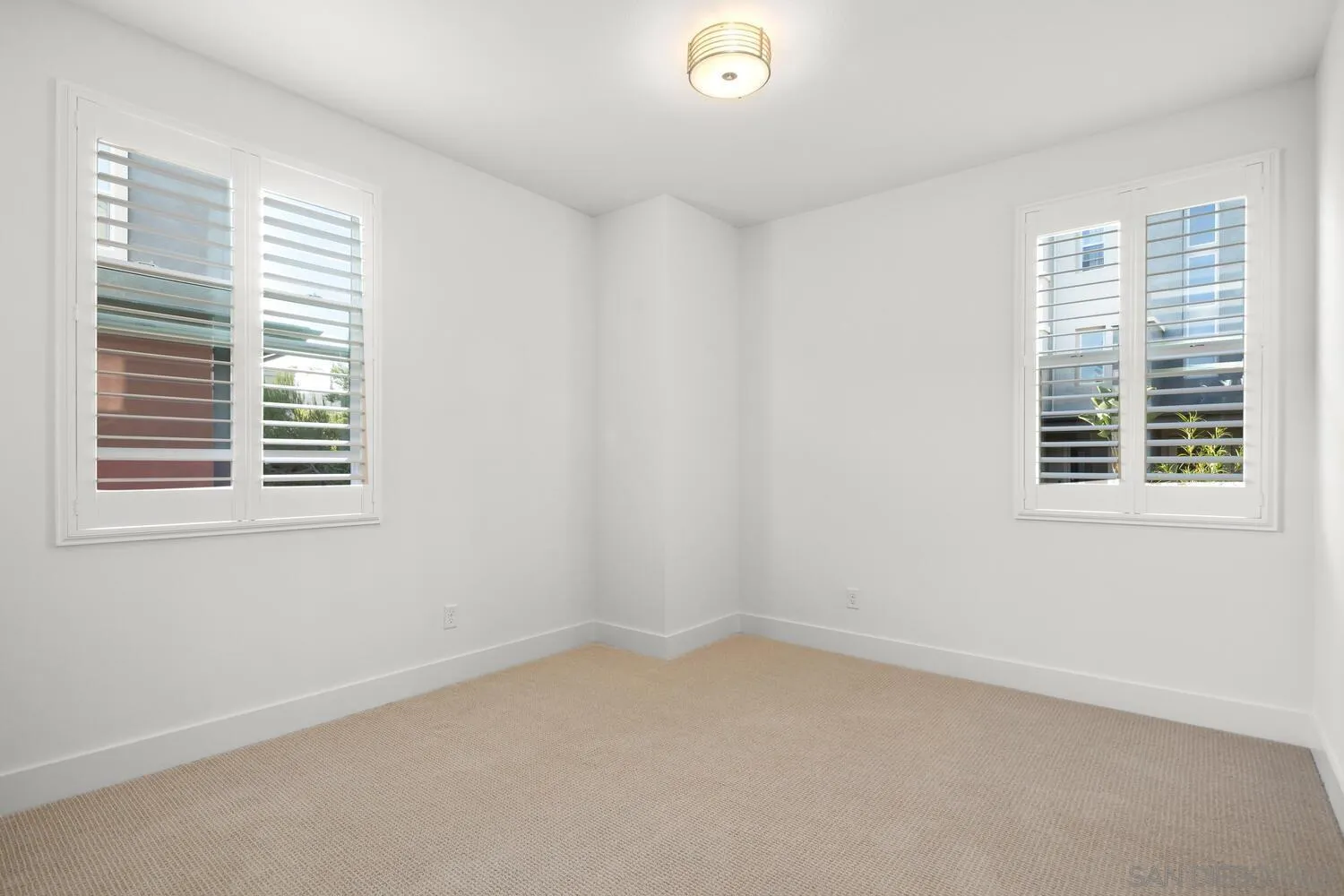 7830 Inception Way San Diego, CA 92108 - Photo 20 of 37 an empty room with a window