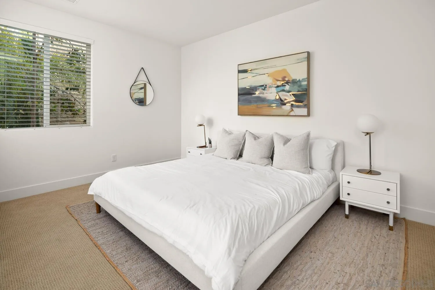 7830 Inception Way San Diego, CA 92108 - Photo 22 of 37 a bedroom with a bed and a large window
