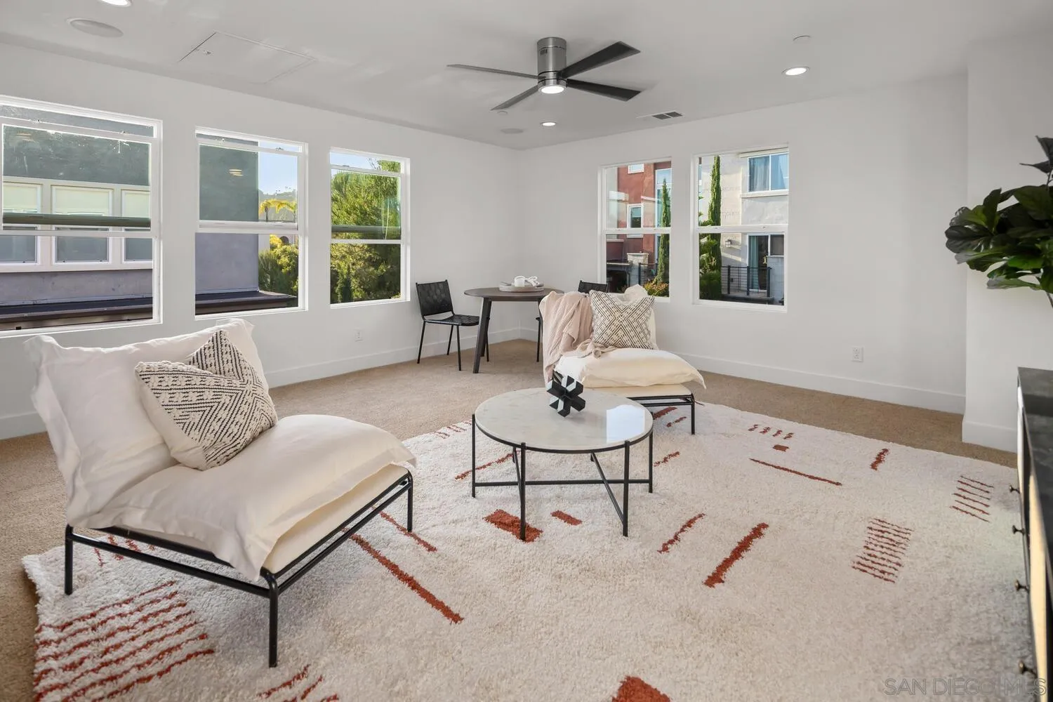 7830 Inception Way San Diego, CA 92108 - Photo 29 of 37 a living room with furniture and a large window