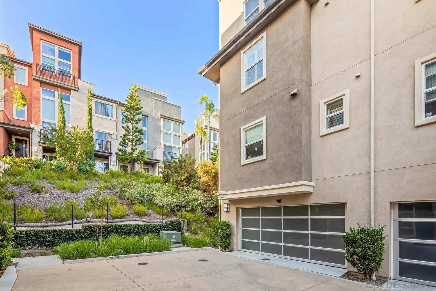 7830 Inception Way San Diego, CA 92108 - Photo 30 of 37 a front view of a building with garden