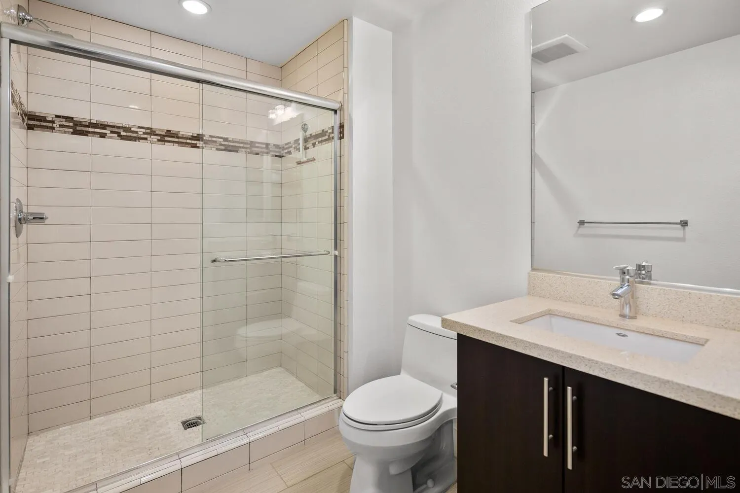 7830 Inception Way San Diego, CA 92108 - Photo 8 of 37 a bathroom with a sink and a mirror