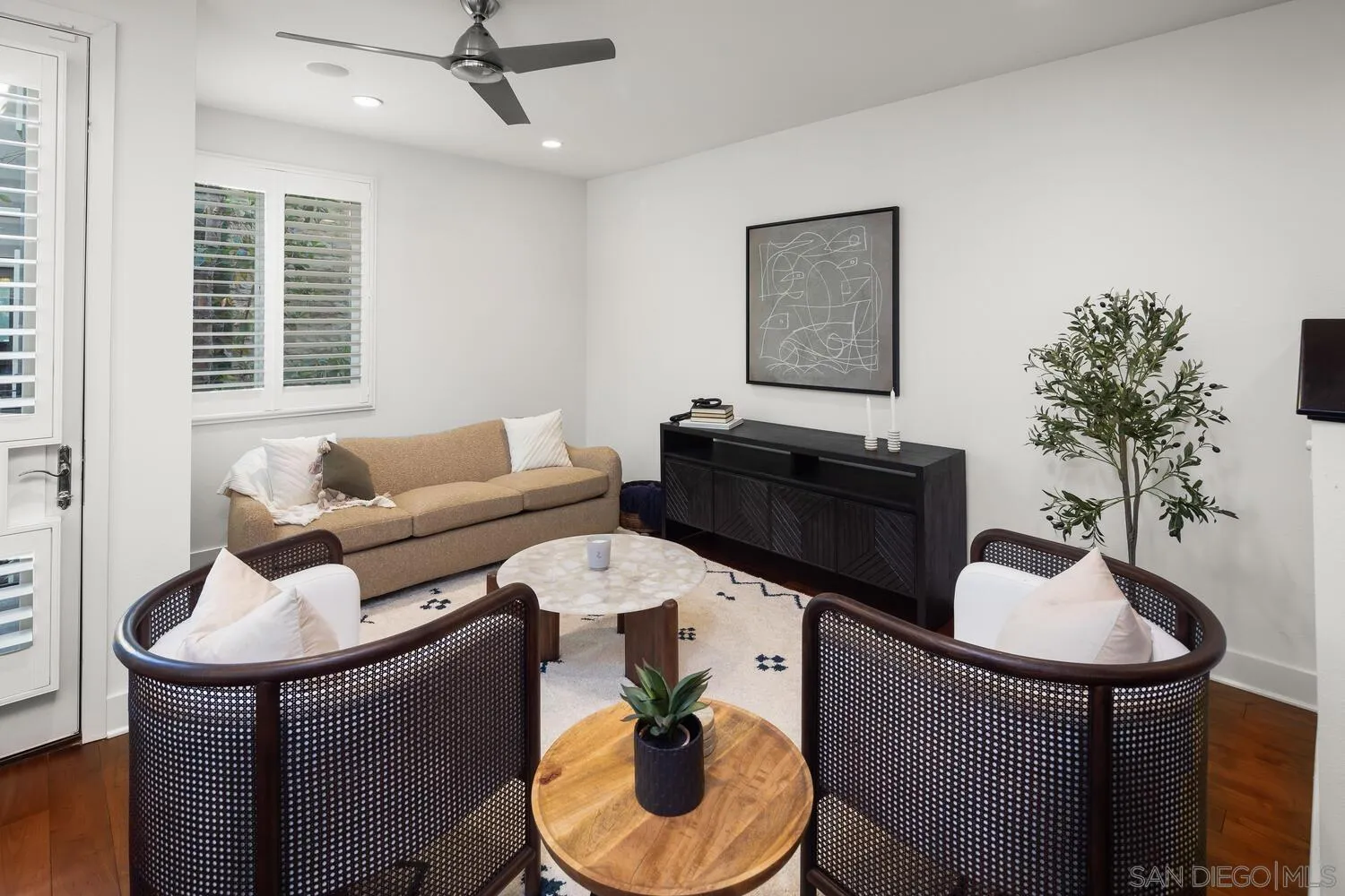 7830 Inception Way San Diego, CA 92108 - Photo 10 of 37 a living room with furniture and a potted plant