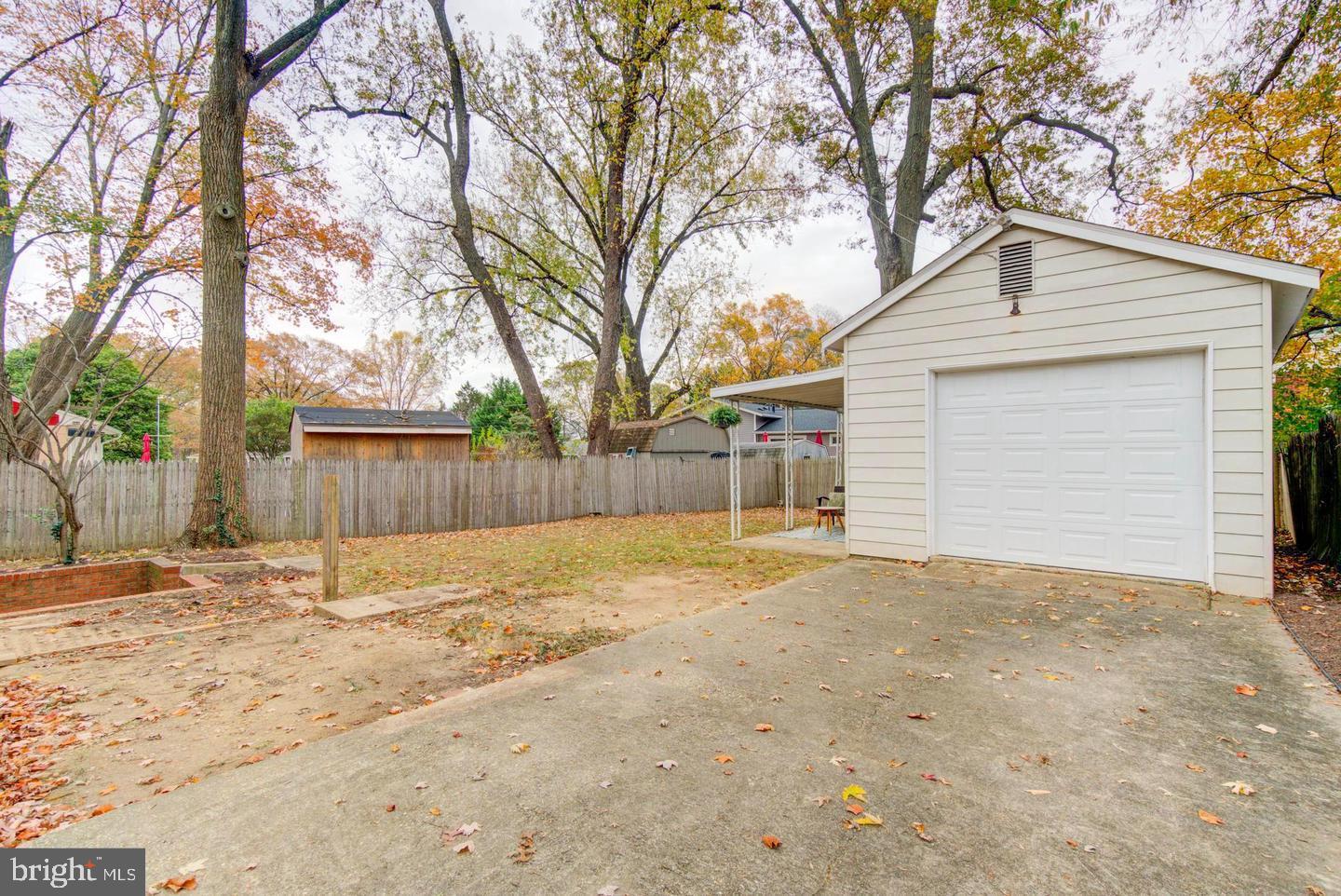 11207 Emack Road Beltsville, MD 20705 - Photo 39 of 43 Charming garage in a serene setting.