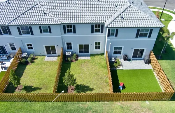 a view of a house with swimming pool