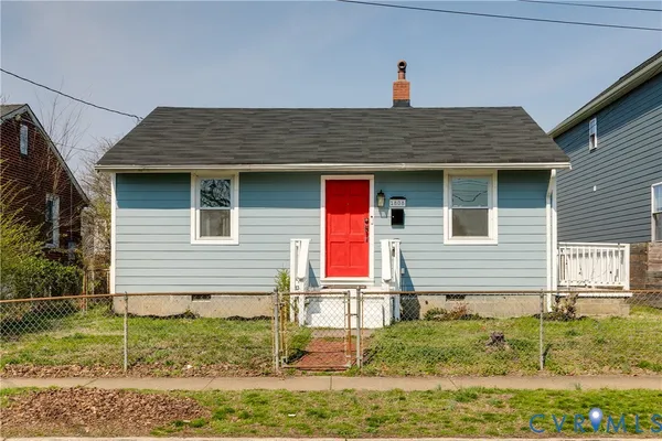 a front view of house with yard