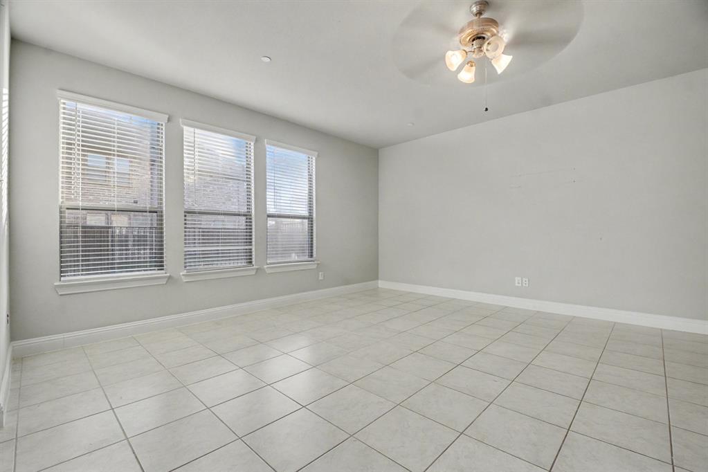 520 Teton Street Allen, TX 75002 - Photo 12 of 26 a view of an empty room with a window