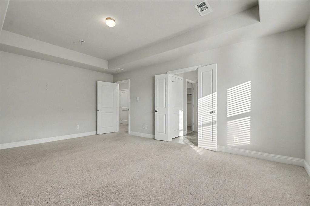 520 Teton Street Allen, TX 75002 - Photo 15 of 26 an empty room with windows