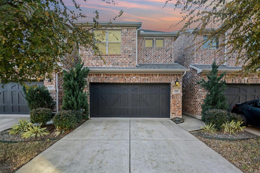 520 Teton Street Allen, TX 75002 - Photo 26 of 26 a front view of a house with a garden