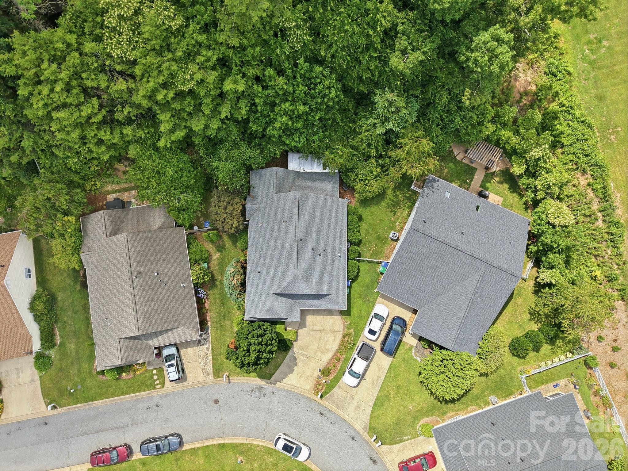 51 Sunview Circle Arden, NC 28704 - Photo 28 of 31 an aerial view of a house with a yard and garden