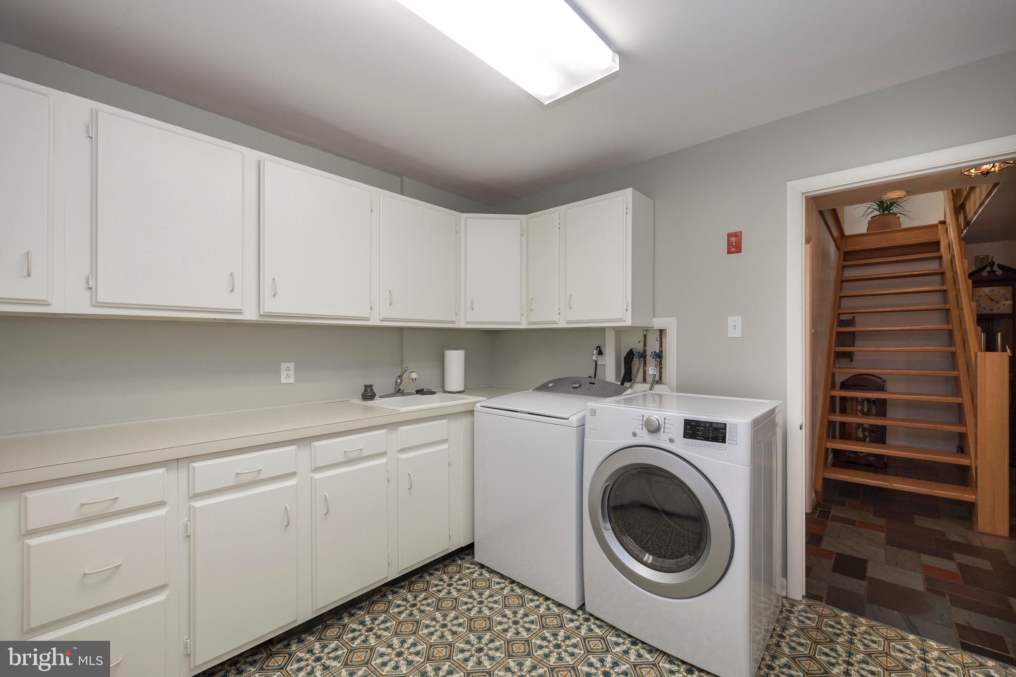 805 Pheasant Run Road West Chester, PA 19382 - Photo 24 of 43 Lower Le el Laundry Room with Tub Sink