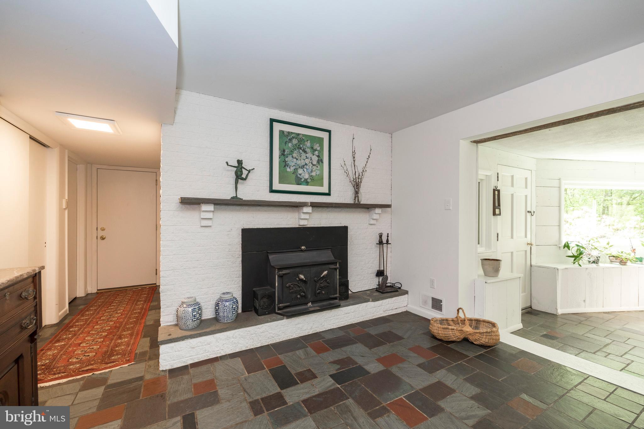 805 Pheasant Run Road West Chester, PA 19382 - Photo 27 of 43 Lower Level Wood Burning Fireplace