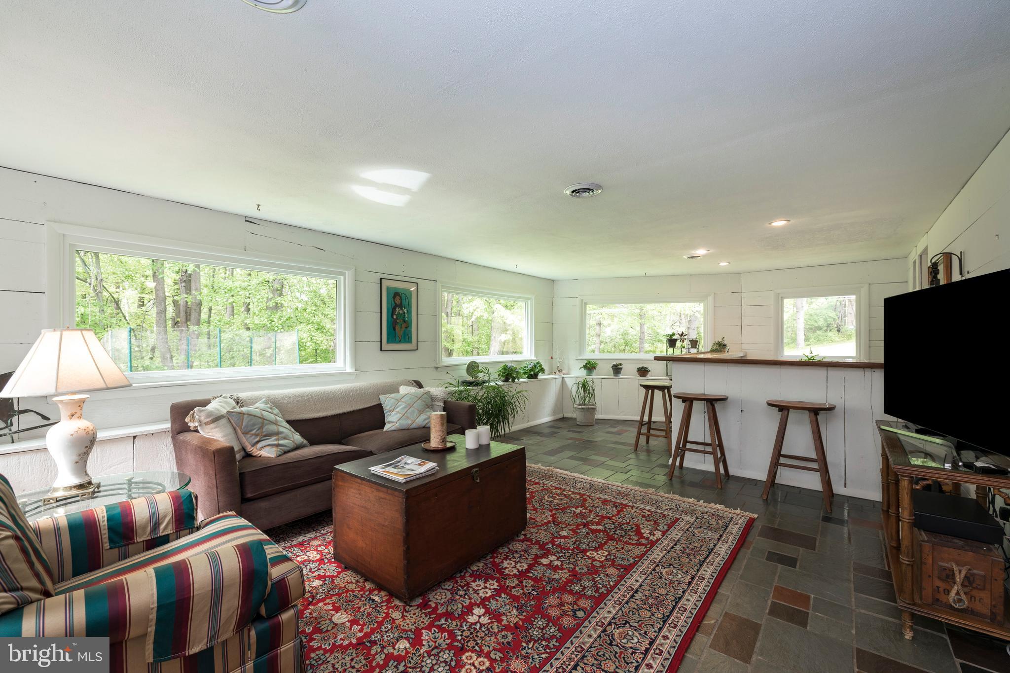 805 Pheasant Run Road West Chester, PA 19382 - Photo 28 of 43 Lower Level Family Room with Bar Area