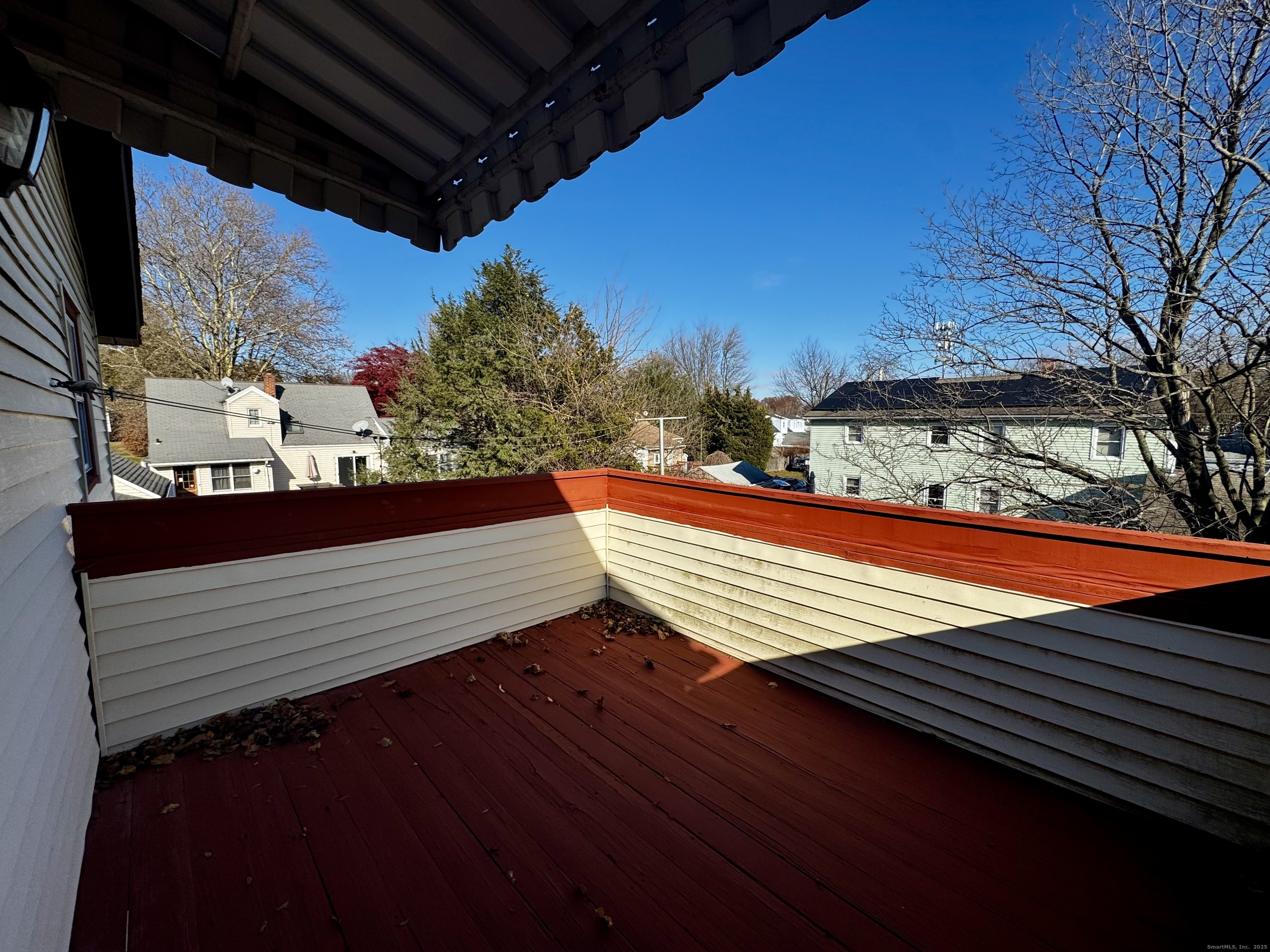 432 Wiklund Avenue Stratford, CT 06614 - Photo 11 of 19 a view of a roof deck with wooden floor and fence