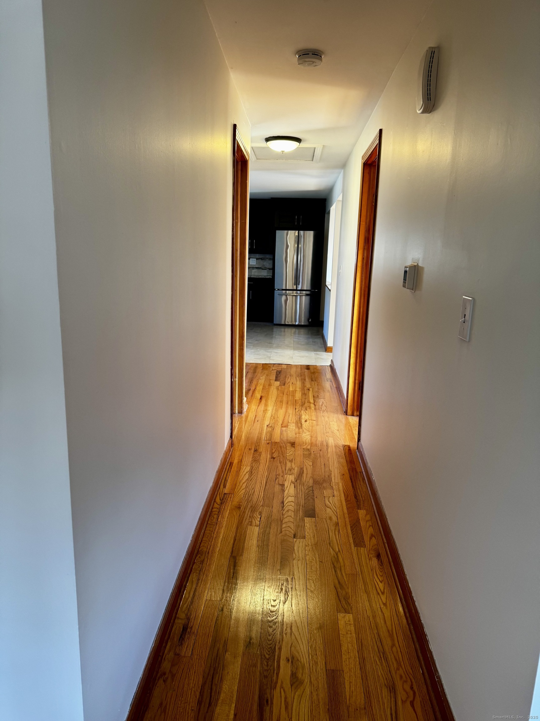 432 Wiklund Avenue Stratford, CT 06614 - Photo 8 of 19 a view of a hallway from a hallway