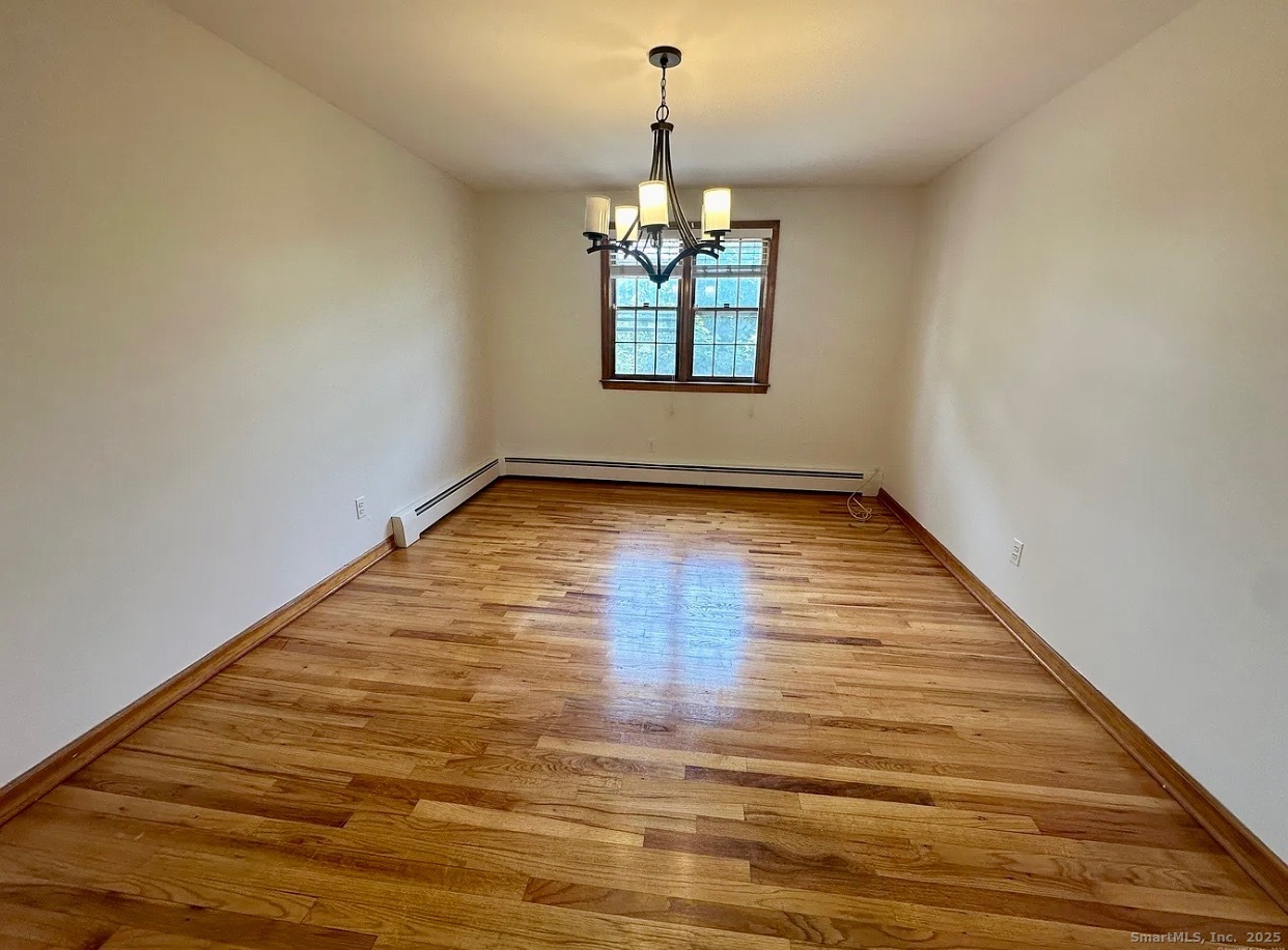 432 Wiklund Avenue Stratford, CT 06614 - Photo 10 of 19 a view of empty room with window