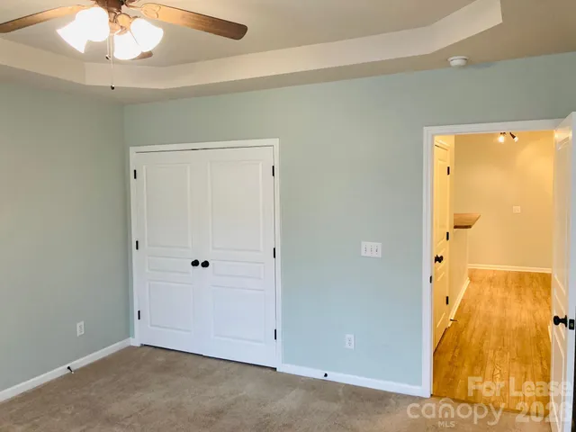 an empty room with a bathroom