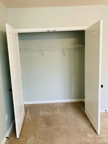 an empty room with a bench